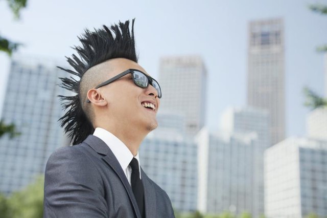 A mohawk adds a daring hairstyle to a 1980s costume. A mohawk adds a daring hairstyle to a 1980s costume.