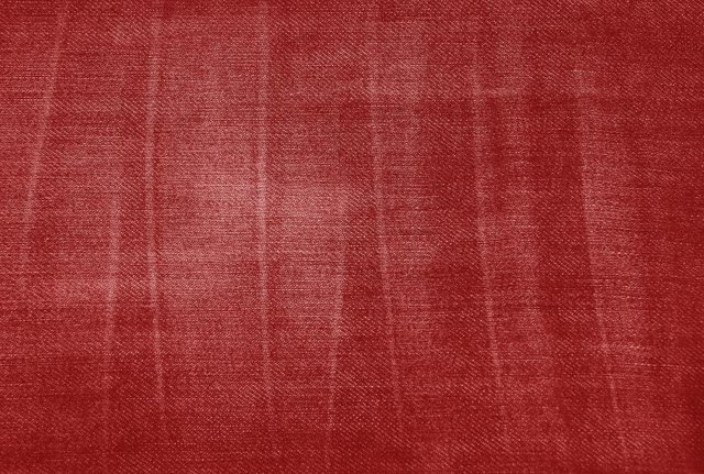 Close-up of a piece of red top grain leather.