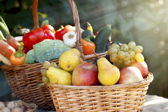 Baskets of fresh produce on a summer table.