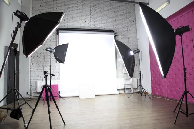 A studio with lights prepared for a photo shoot.