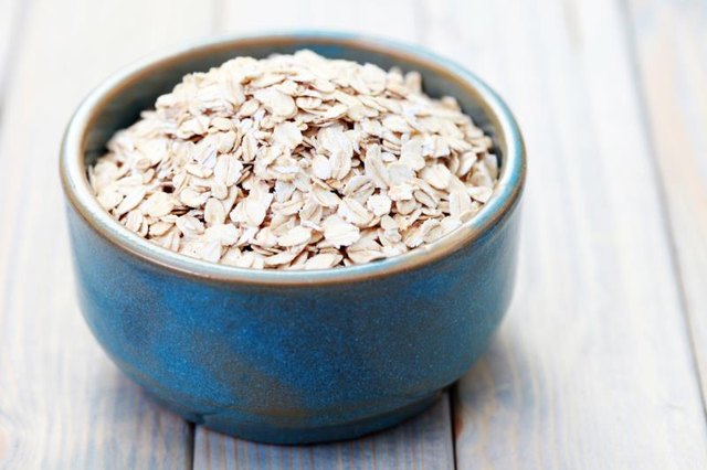 A large bowl of dry oats.