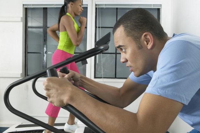Young man practicing cardiovascular exercise at the gym