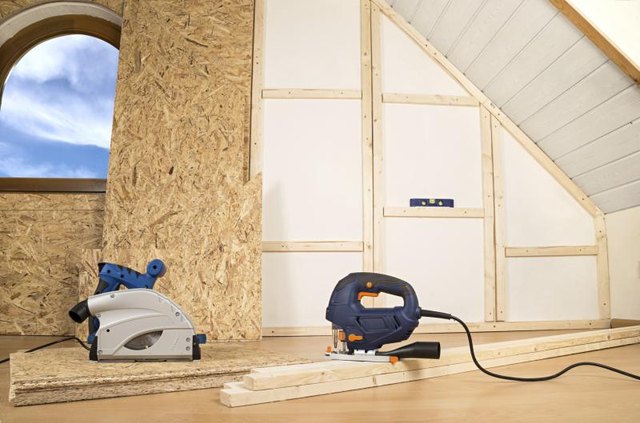 Plywood installation in home interior walls.