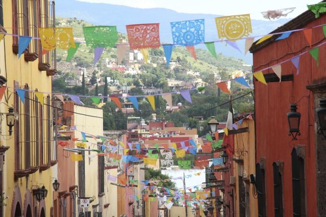 Mexican street with colorful decorations. Mexican street with colorful decorations.