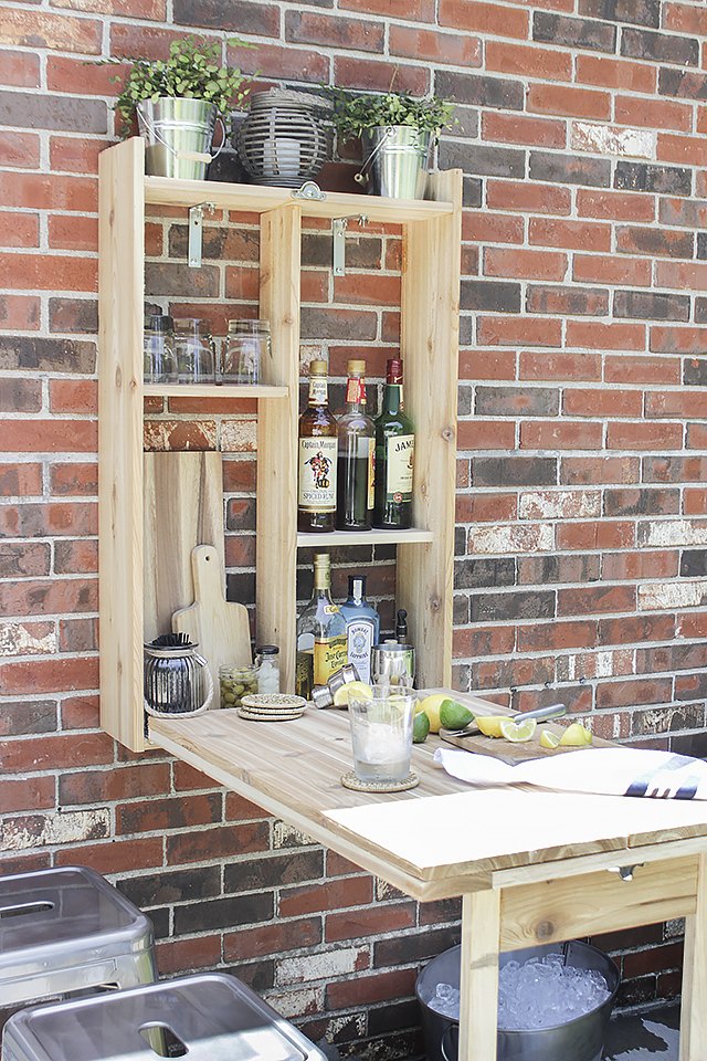  utensils as the perfect prep and serving station for an outdoor grill