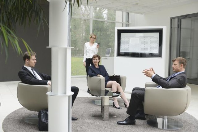 Business meeting in a modern office. Business meeting in a modern office.