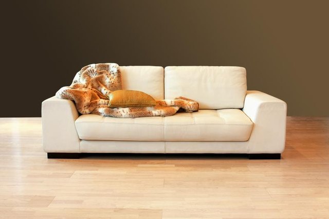 Colorful throw on ordinary white sofa. Colorful throw on ordinary white sofa.