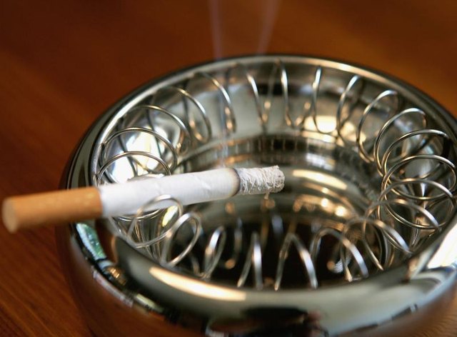 Ashtray and cigarette Ashtray and cigarette