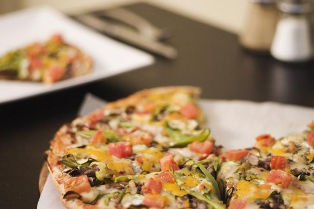 Slices of pizza on the counter. Slices of pizza on the counter.