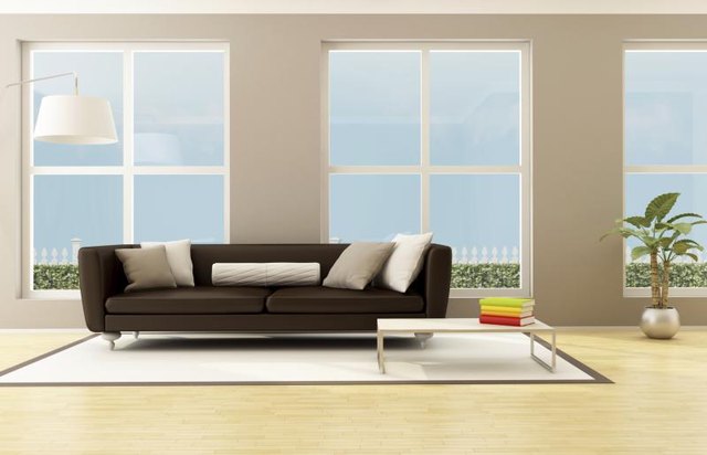 Neutrals of gray and white pair seamlessly with brown leather furniture. Neutrals of gray and white pair seamlessly with brown leather furniture.