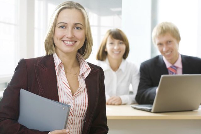 Three business woman are in the office. Three business woman are in the office.