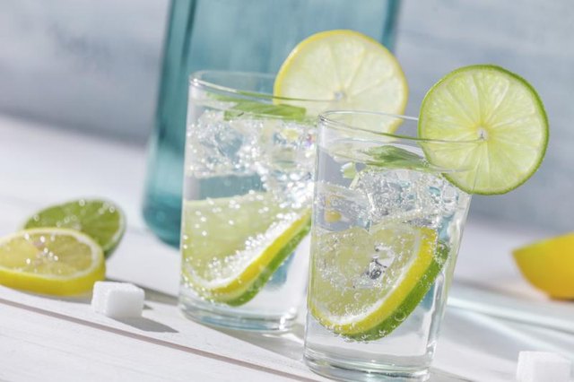 Two glasses of water with lime. Two glasses of water with lime.