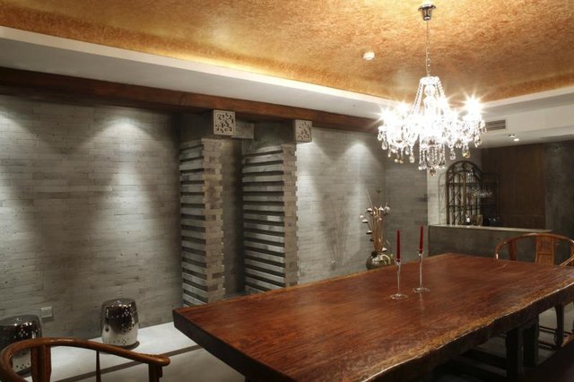 A large wooden table in a modern room. A large wooden table in a modern room.