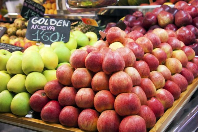 Apples for sale at a market. Apples for sale at a market.