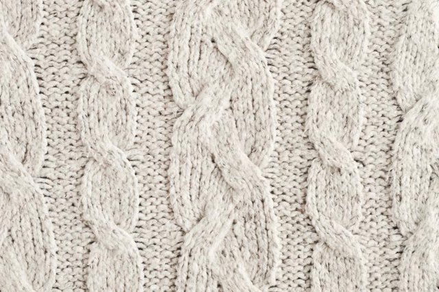Close-up of a knitted wool jacket. Close-up of a knitted wool jacket.