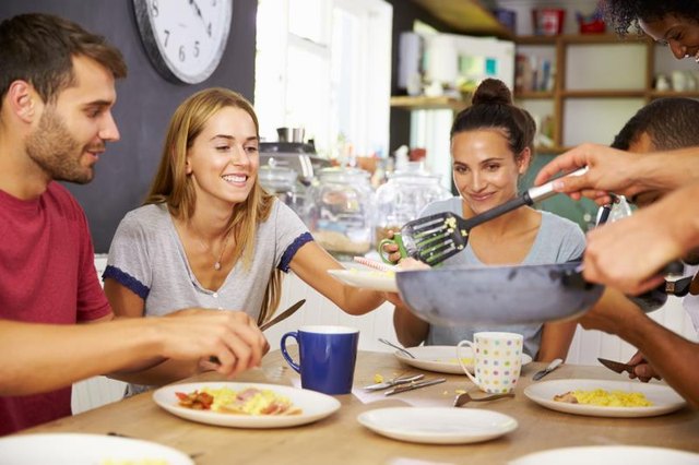 Group of friends having breakfast together Group of friends having breakfast together