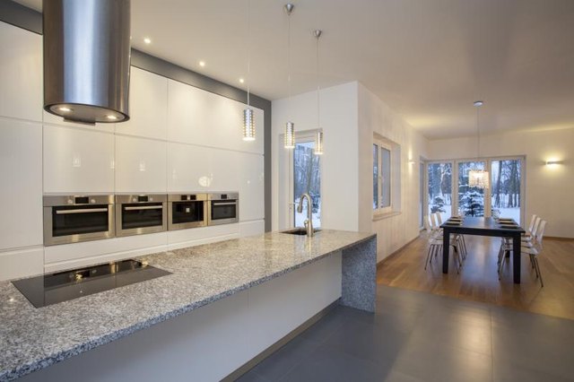 A modern kitchen featuring a granite countertop. A modern kitchen featuring a granite countertop.