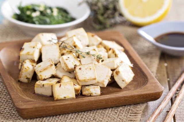 Small plate with baked tofu. Small plate with baked tofu.