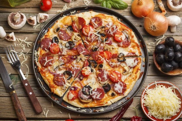 Pizza loaded with toppings Pizza loaded with toppings