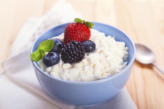 Small bowl of cottage cheese. Small bowl of cottage cheese.