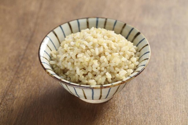 Small bowl of boiled brown rice. Small bowl of boiled brown rice.