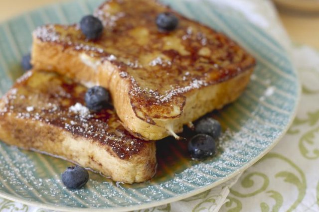 Plate of French toast with blueberries. Plate of French toast with blueberries.