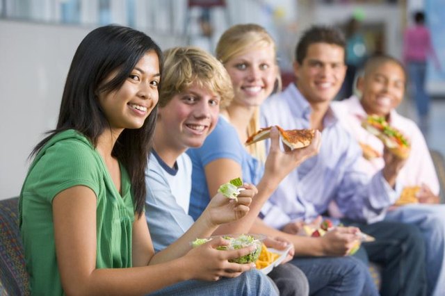 Kids casually eating dinner. Kids casually eating dinner.