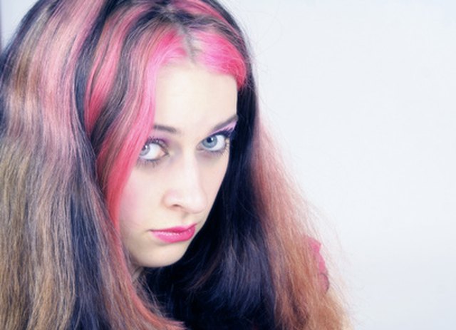 Colored hairspray temporarily changes your hair color for Halloween or other occasions.