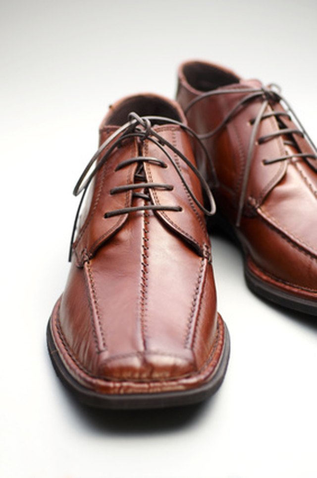 Remove dark ink spots from your leather shoes with a mild soap.