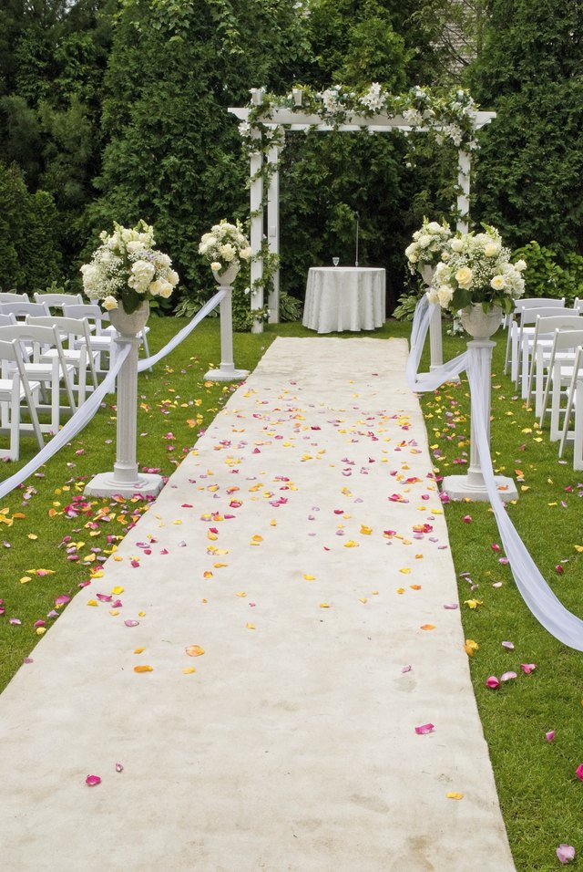 Backyard prepared for wedding ceremony