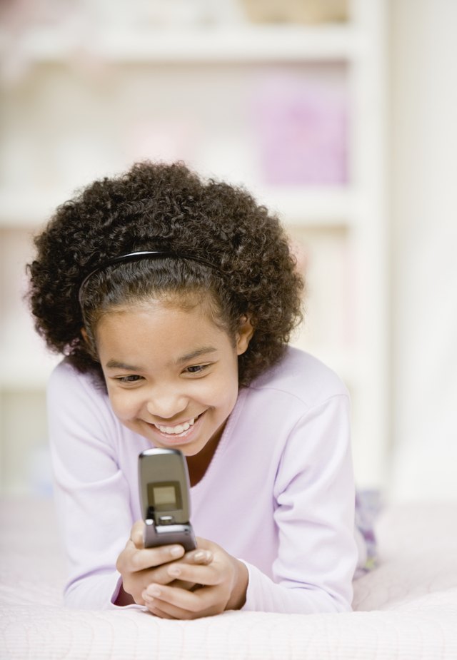 Girl playing with cell phone