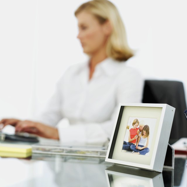 Close-up of framed photo on desk.