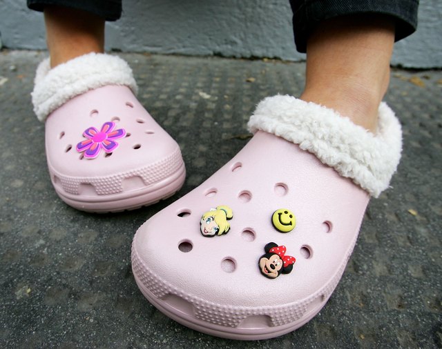 Close-up of Crocs on a little girl's feet.