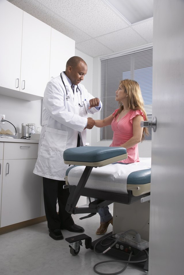 Doctor doing a patient check-up.