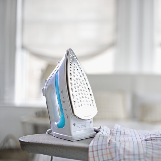 Iron with holes for steam
