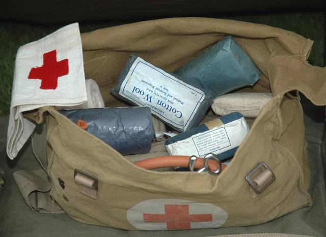 The Red Cross symbol on a military first aid kit. The Red Cross symbol on a military first aid kit.