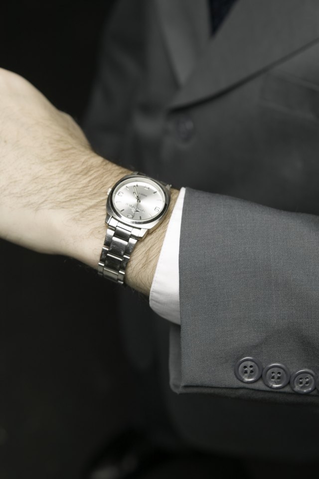 Use a microscrewdriver to remove a link from your watch.