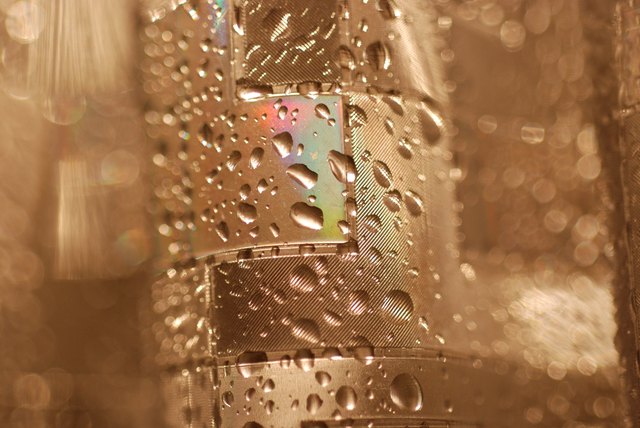 Close up of vinyl fabric shower curtain.