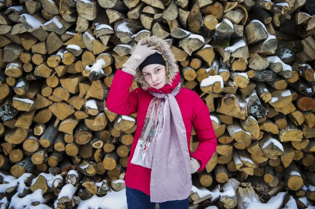 Down coats need to be washed separately from their fur trimmed-hood.