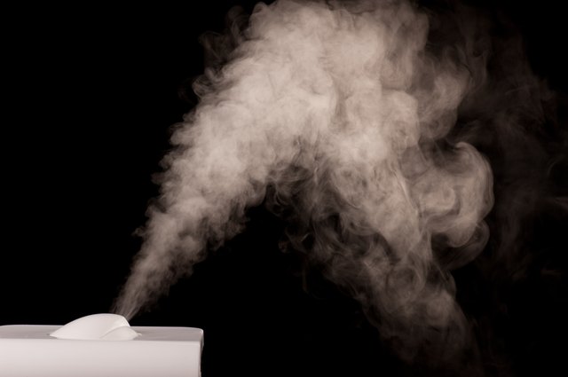 A humidifier keeps the room moist.