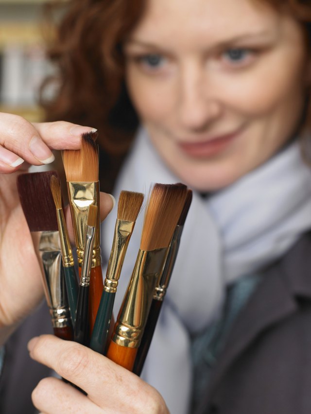 Use a small paintbrush to apply Sea Glow to clear soles.