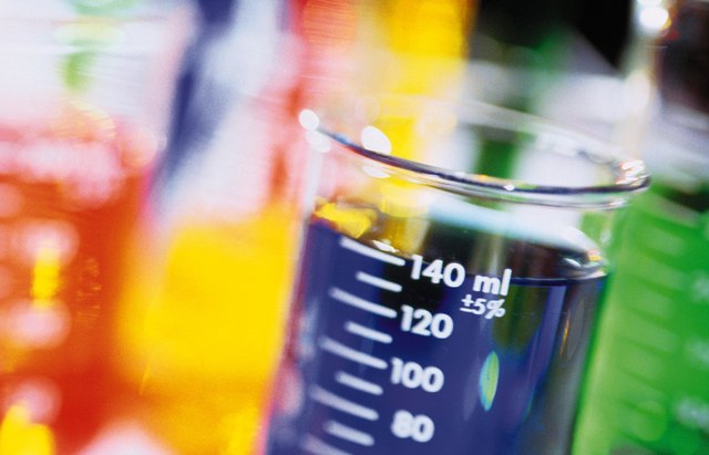 Chemicals in beakers.
