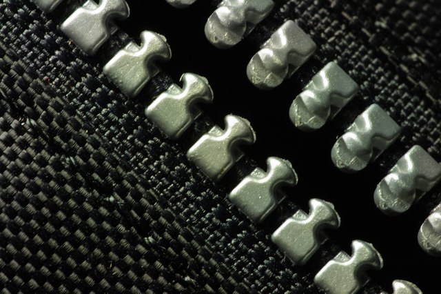 Misaligned teeth cause zippers to zip without closing.