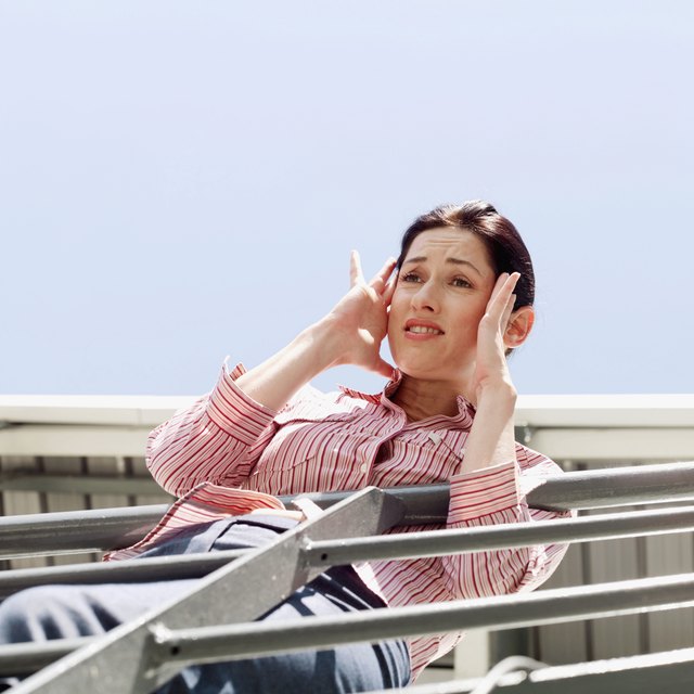 woman experiencing vertigo
