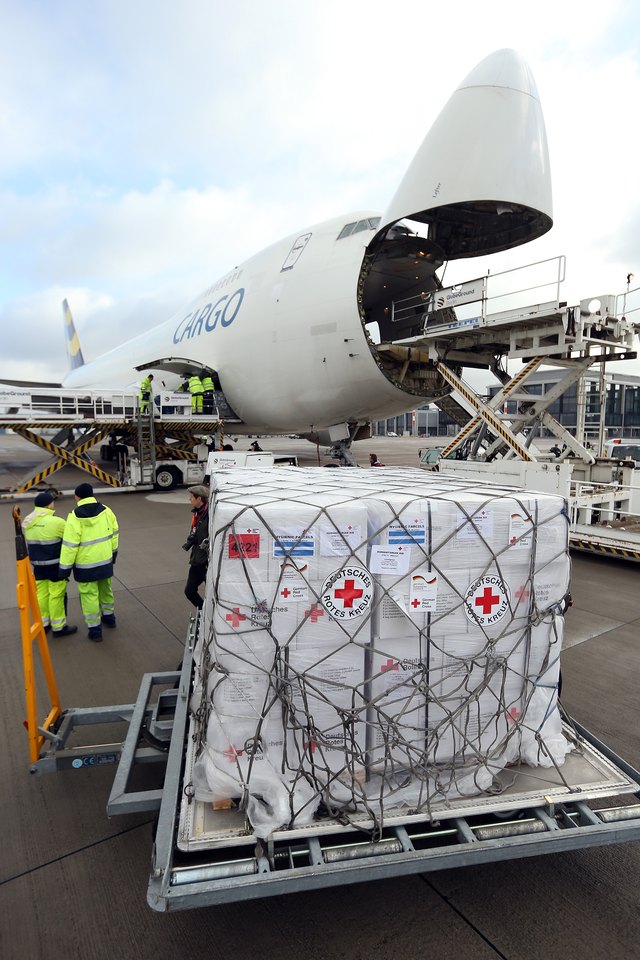 The Red Cross flies in supplies to victims of a natural disaster.
