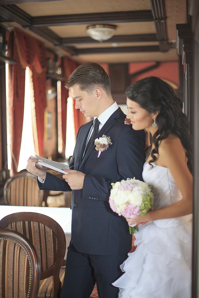 Bride and groom getting married in restaurant