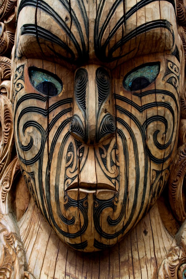 A close-up of a Maori wood carving.