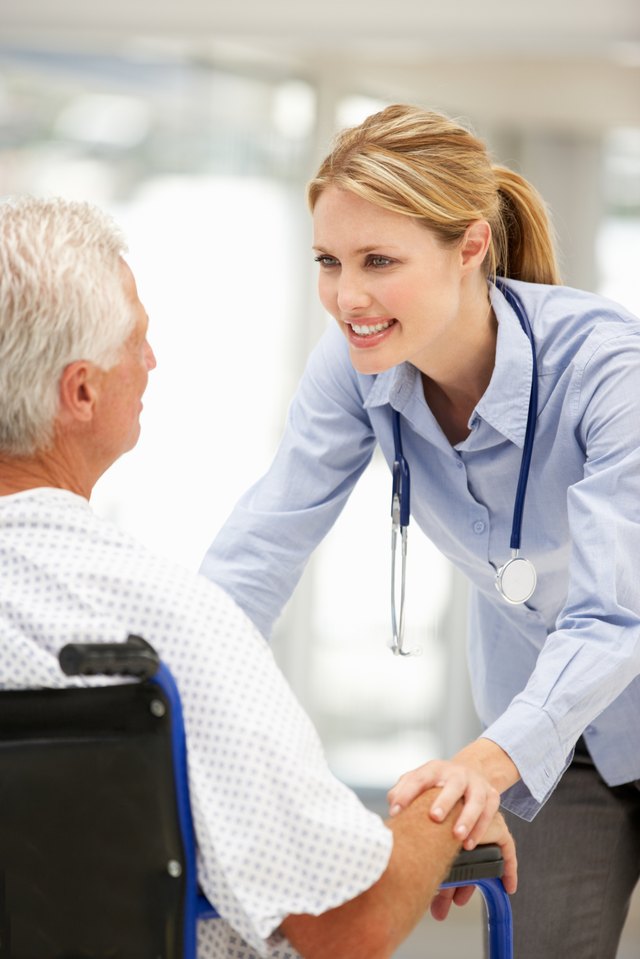 Doctor talks to senior man