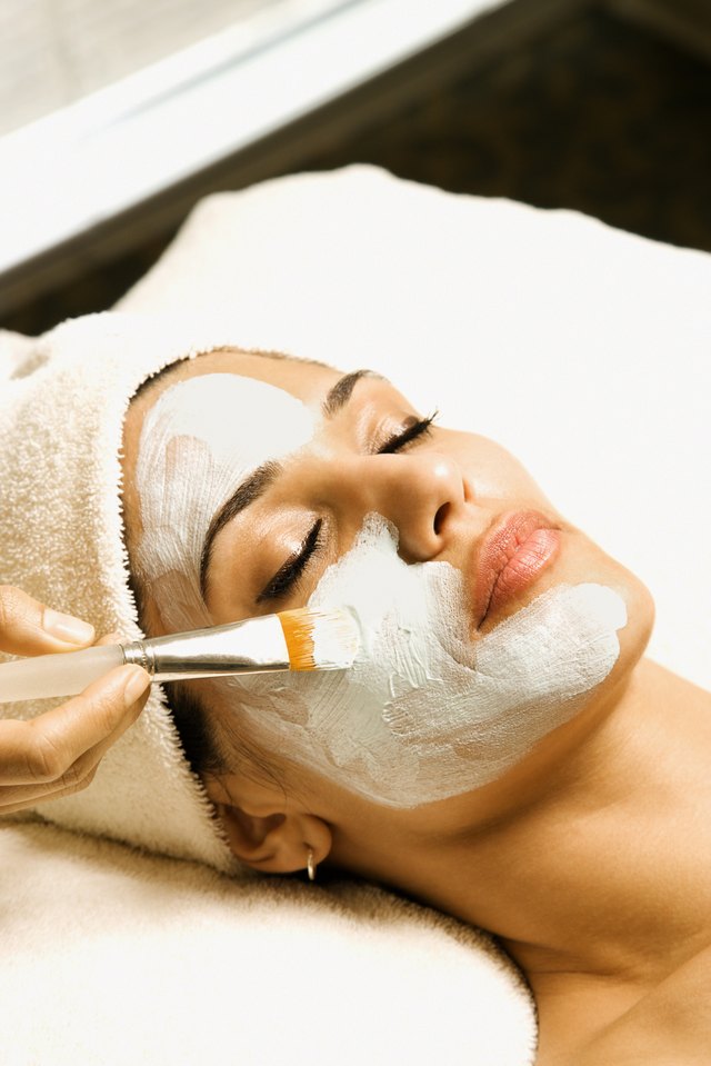Woman at spa getting a facial