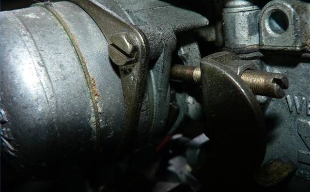 Here's an example of what your idle screw might look like; it's the flathead screw on the right.